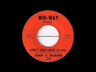  - Bobby D. Husband