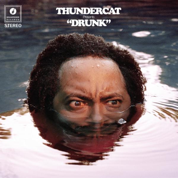 Drunk [Explicit] - Thundercat featuring Michael McDonald and Kenny Loggins